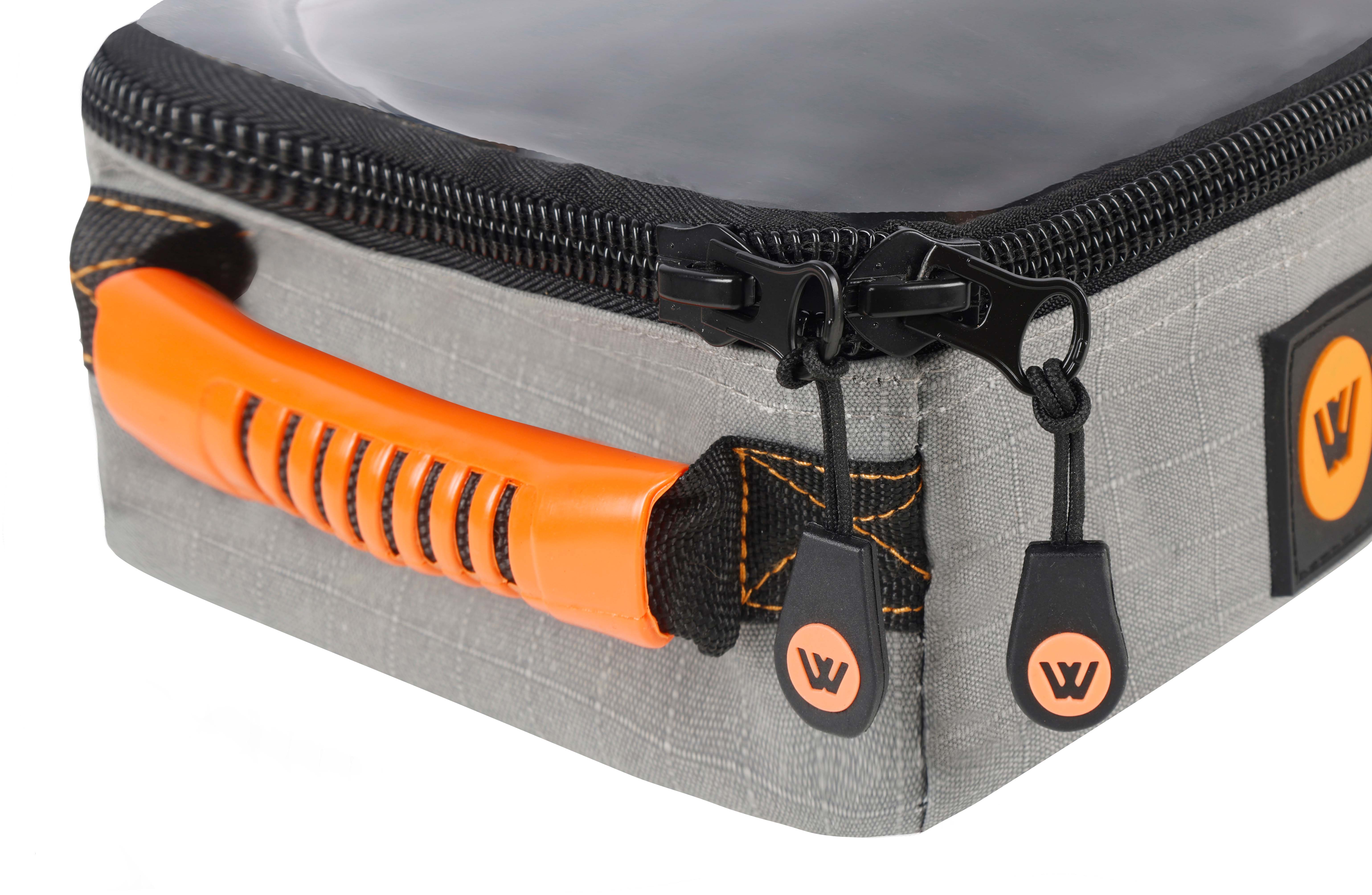 Wildtrak canvas bag with reinforced orange handle for easy carrying.