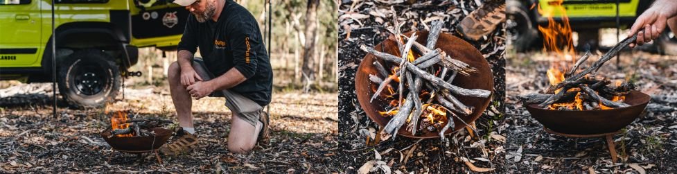black fire pit with wood logs on a round stone base